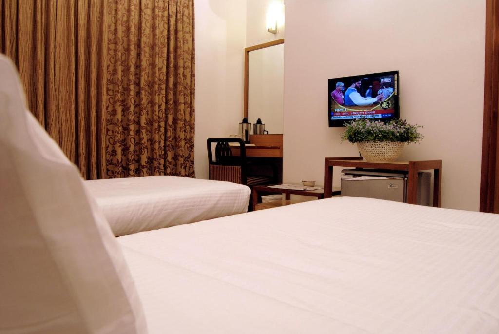 The Ambience Hotel Pune Zimmer foto