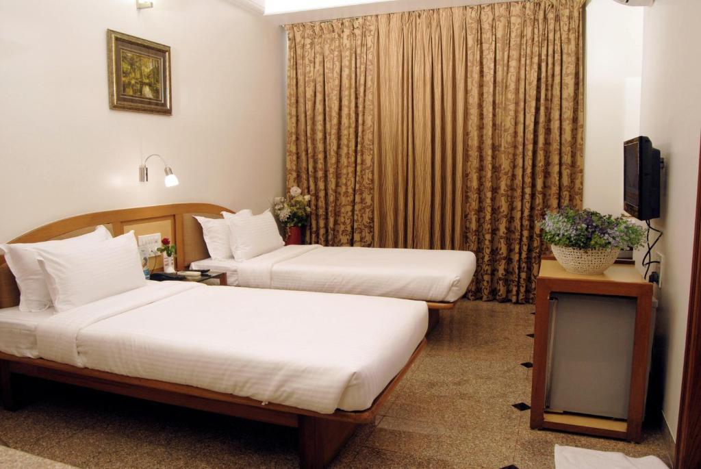 The Ambience Hotel Pune Zimmer foto